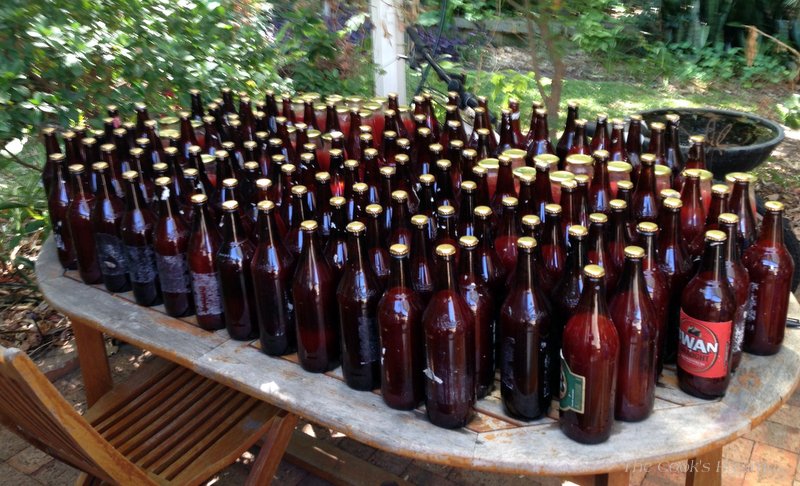 How To Make Tomato Passata: 188 bottles of boiled sauce lined up on the table