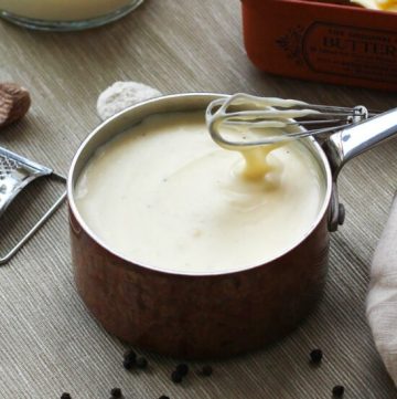 A Simple Bechamel {White} Sauce. An easy recipe with so many uses. It also freezes well, so tuck some in the freezer for a quick meal.