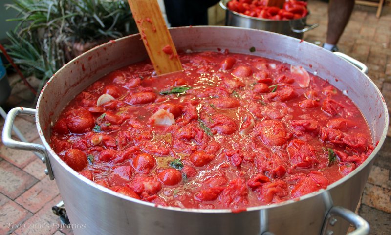 How To Make Tomato Passata : A large pot of tomatoes and onions simmering