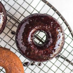 Baked Berry Spelt Doughnuts are quick to make, packed full of berries, and are the perfect size to tuck into a lunchbox.