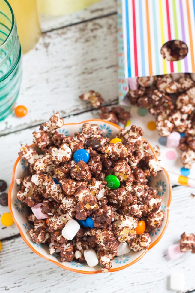 Chocolate Covered Popcorn. Ready in 15 minutes, and perfect for kids parties. A great use for leftover Easter chocolate.