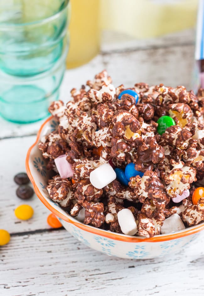 Chocolate Covered Popcorn. Ready in 15 minutes, and perfect for kids parties. A great use for leftover Easter chocolate.