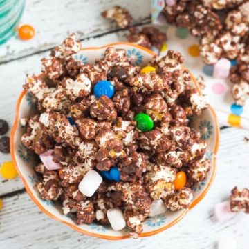 Chocolate Covered Popcorn. Ready in 15 minutes, and perfect for kids parties. A great use for leftover Easter chocolate.