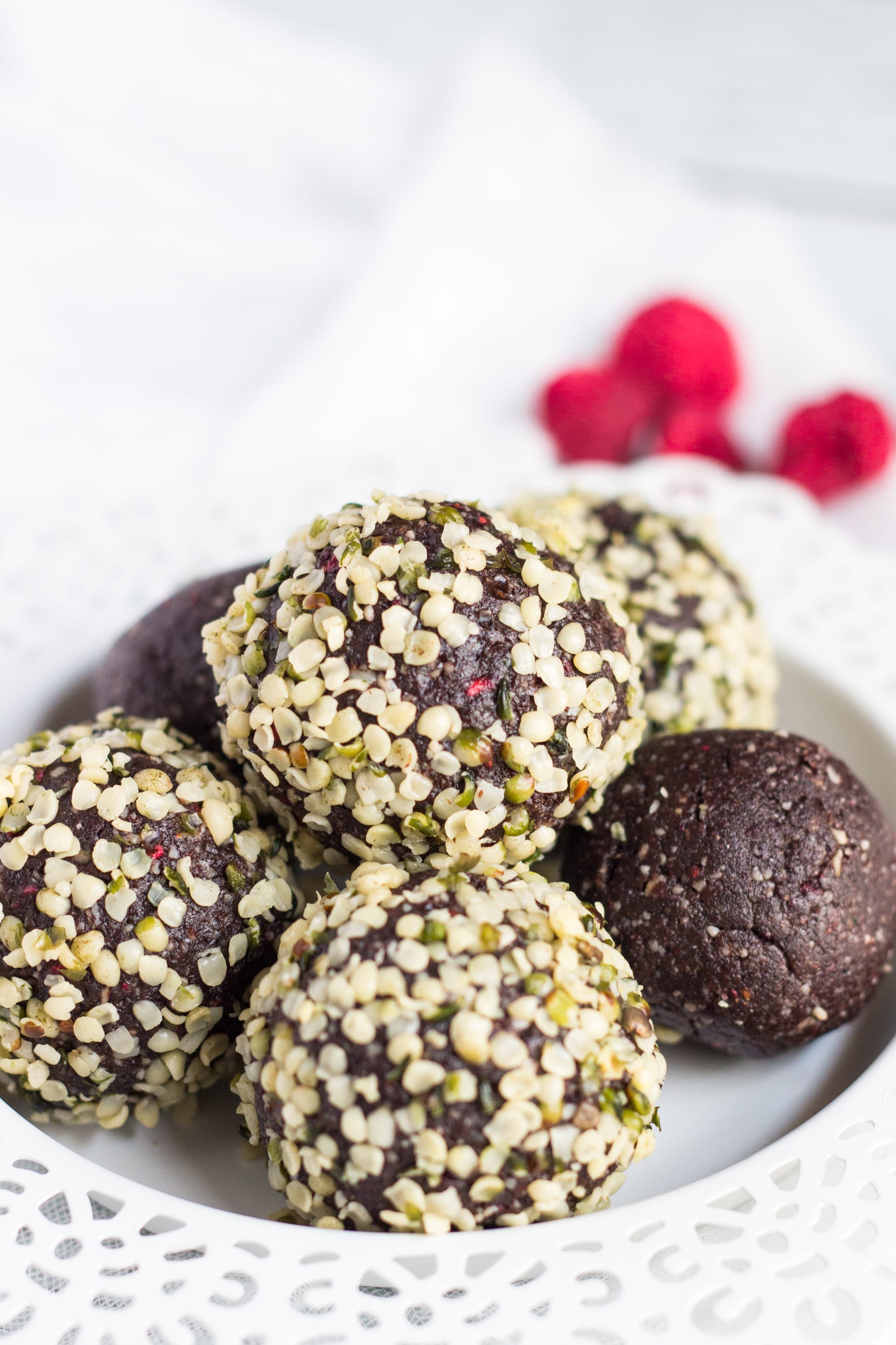 Nut Free Raspberry Bliss Balls. Dense, fudgy & great for tucking into kids lunchboxes. An easy way to increase protein in the diets of picky eaters.