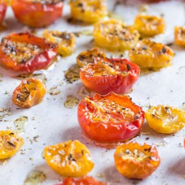 Oven Dried Cherry Tomatoes. Toss these little flavour bombs through pasta and salads, or eat straight from the tray.