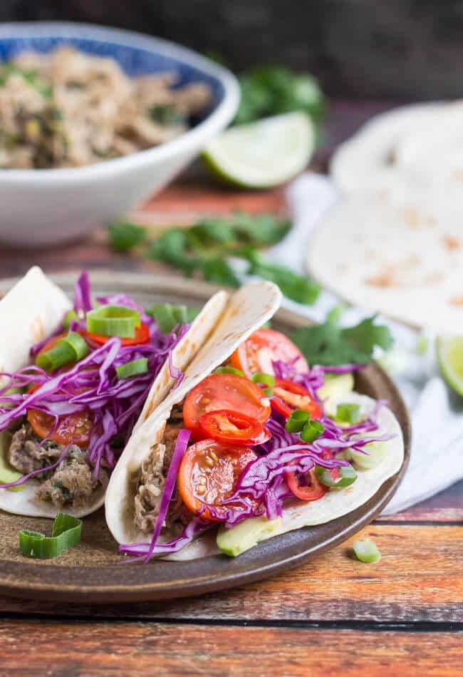 Slow Cooker Lime Cilantro Chicken Tacos. Dinner in under 15 minutes. 