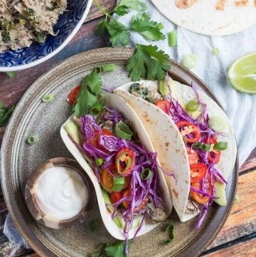 Slow Cooker Lime Cilantro Chicken Tacos. Dinner in under 15 minutes.