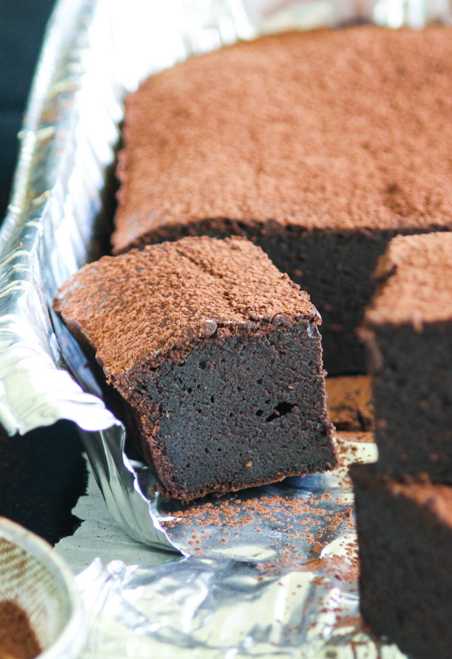 Chocolate & Guinness Spelt Brownies are the little black dress of the dessert department.  Dress them up or down depending on your needs. | thecookspyjamas.com