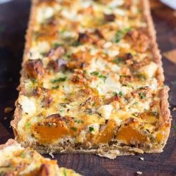 This Sweet Potato and Feta Tart, with its hidden layer of caramelised onion, is the perfect vegetarian dish for an easy lunch or a light dinner.