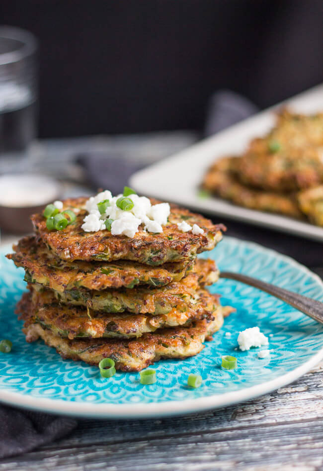 A stack of zucchini & feta fritters, made with leftover quinoa.